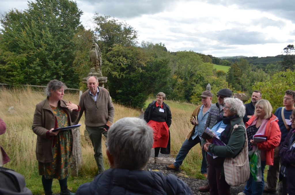 New Futures advisor Claire Martin and Bedrule Church Future chairman Alan Bailey taking attendees on a maintenance-focussed walkthrough of Bedrule Kirk.